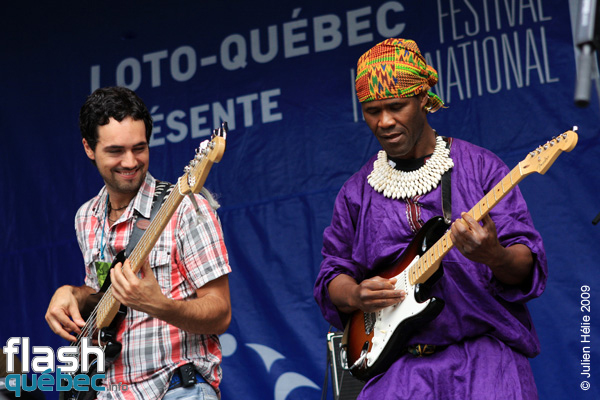Spectacle de la formation Gotta Lago (CÃ´te d'Ivoire / Qc) dans le cadre du Festival International des Nuits d'Afrique de MontrÃ©al, le 24 juillet 2009 Place Ãmilie-Gamelin. Utilisation quelle qu'elle soit strictement interdite sans l'accord de l'auteur spiritpictures@hotmail.fr.